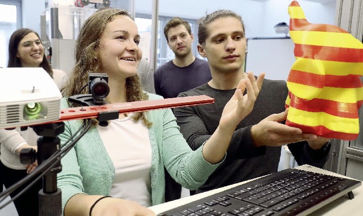 Students working on a 3d printed object